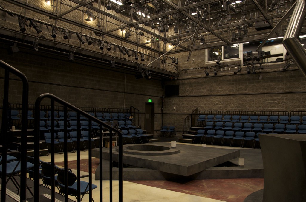 Set on the Black Box stage, consisting on two large, grey platforms skewed on a 45 degree angle