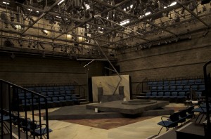 Set on the Black Box stage. Consists of two grey platforms, a rectangular wall, and a large metal tree